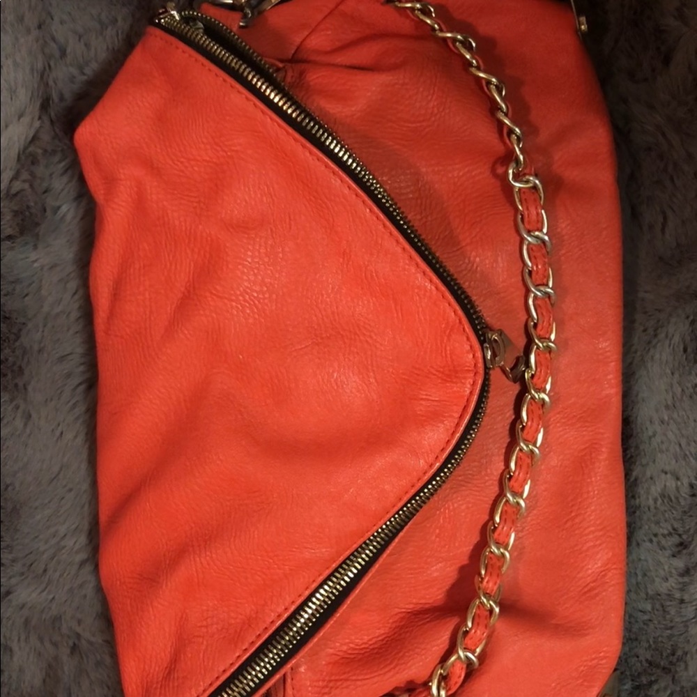 Coral purse with gold accents